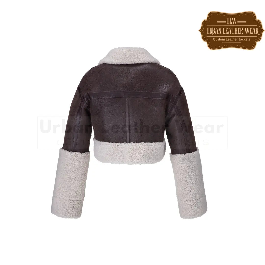 Shop our Nida shearling bomber jacket. The luxurious shearling material will keep you cozy, while the bomber style adds a trendy touch to any outfit.